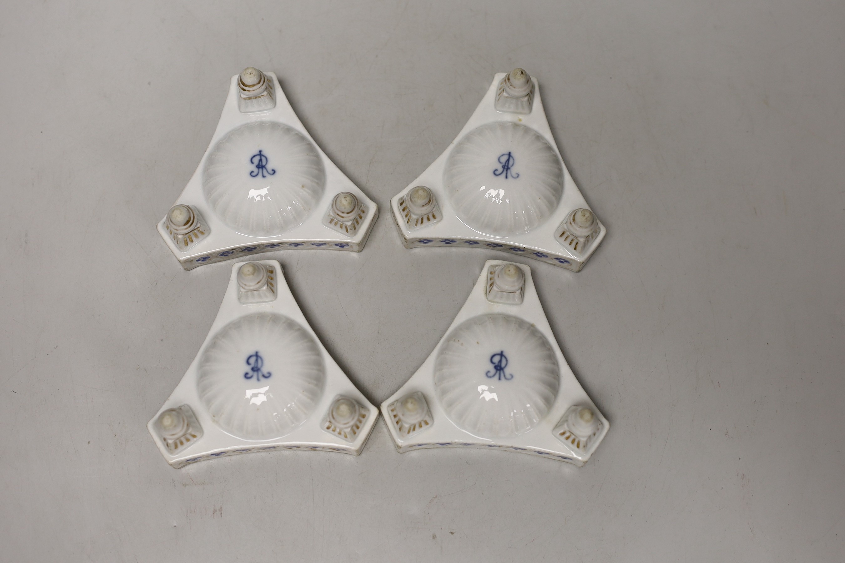 A set of four Dresden triangular cherub salts, Helena Wolfsohn atelier, 8cms wide